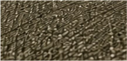 Macro view of the olive Soft Weave upholstery.